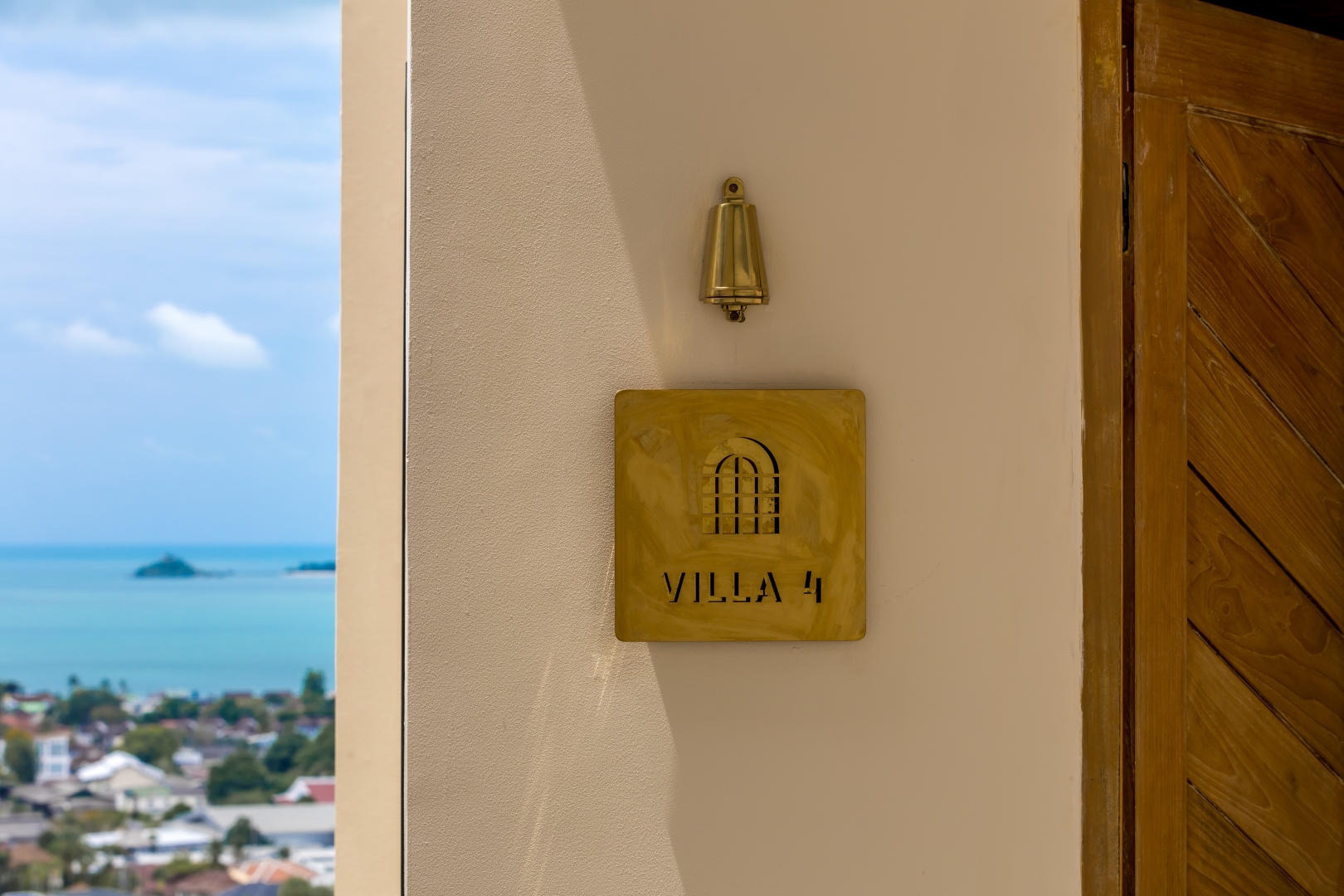 Brass villa signage